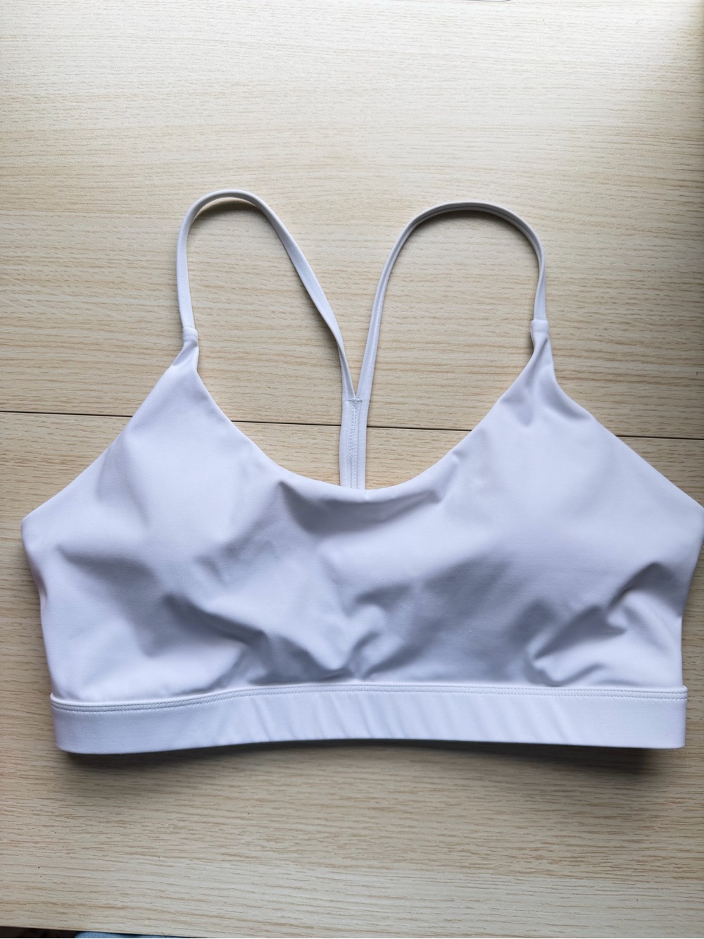 Large- Lululemon white nylon & spandex sports bra in a L